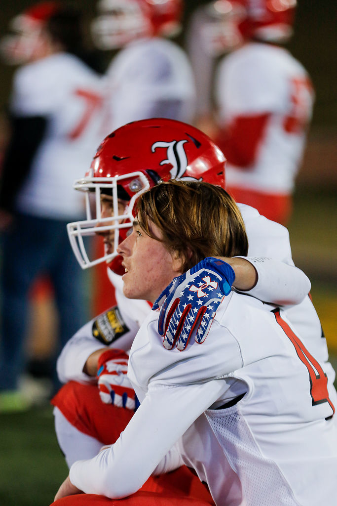 Lincoln player Lee Yutzy comforts teammate Devon Parrott